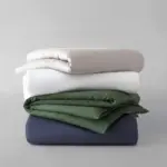 Soft and supportive layered bedding with high-quality linens, perfect for a comfortable sleep experience. Designed for mattress enthusiasts seeking comfort, durability, and value.