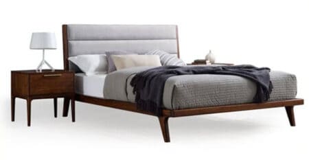 Elegant bedroom furniture featuring a stylish bed with plush headboard and matching nightstand, ideal for improving sleep quality and bedroom aesthetics.